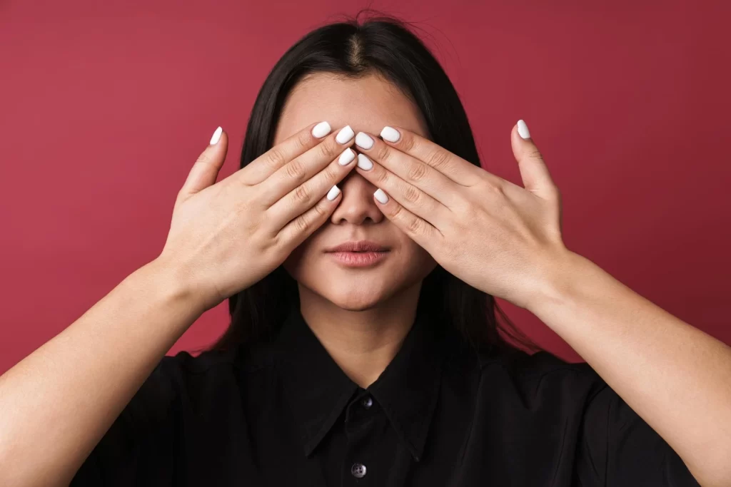 girl with covered face